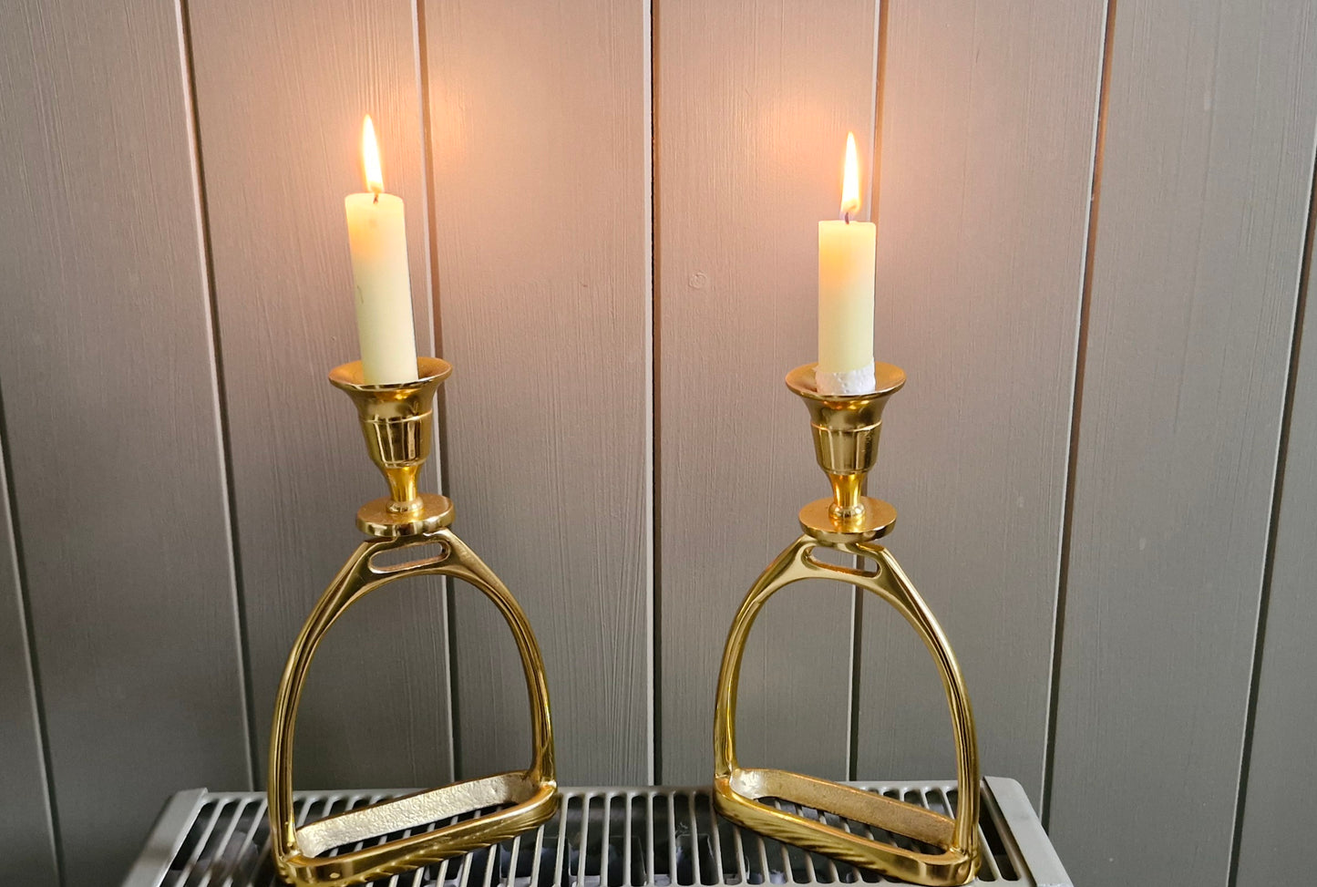 Pair of gold Plated Stirrup Candlestick Holders