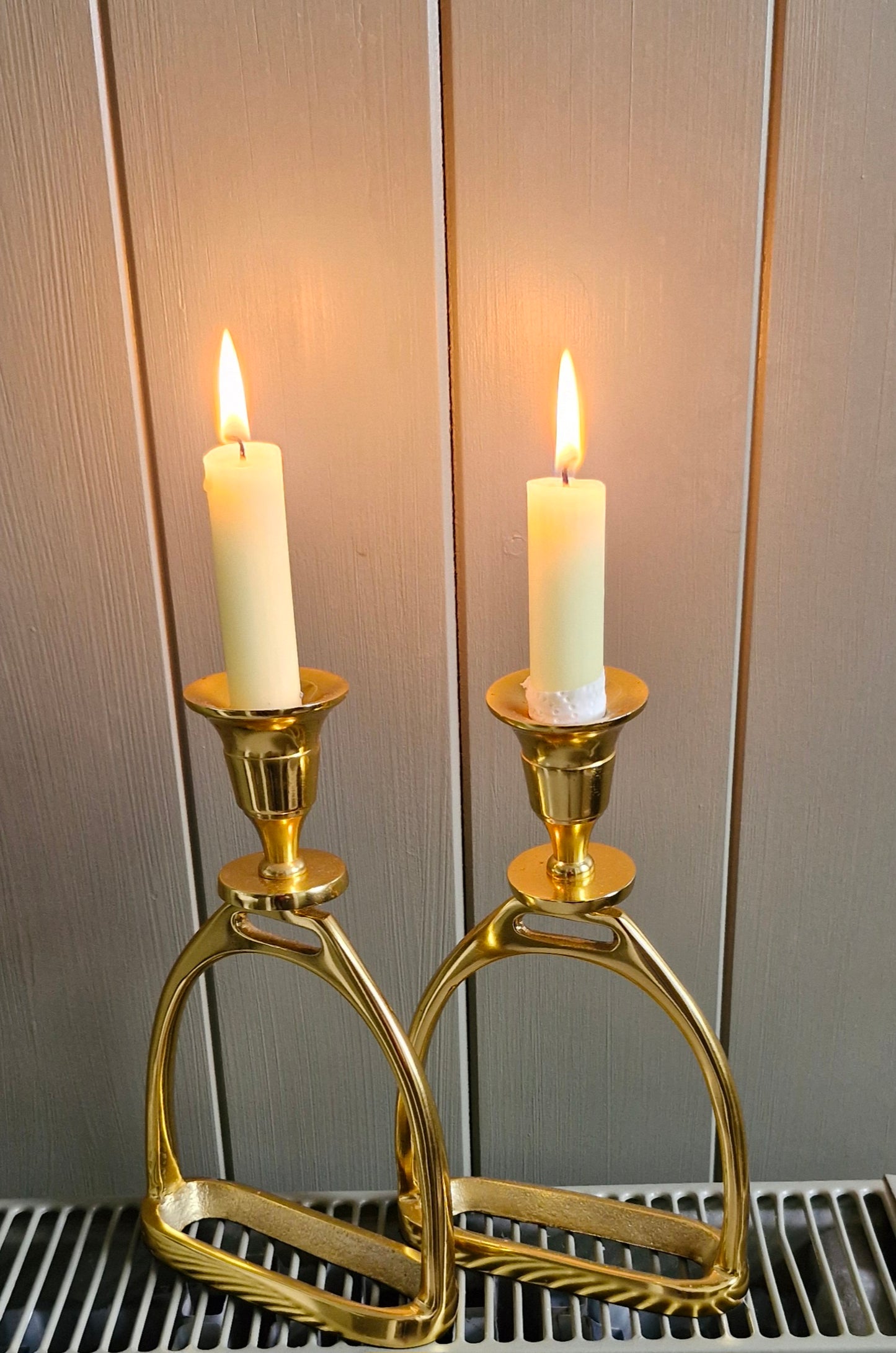 Pair of gold Plated Stirrup Candlestick Holders