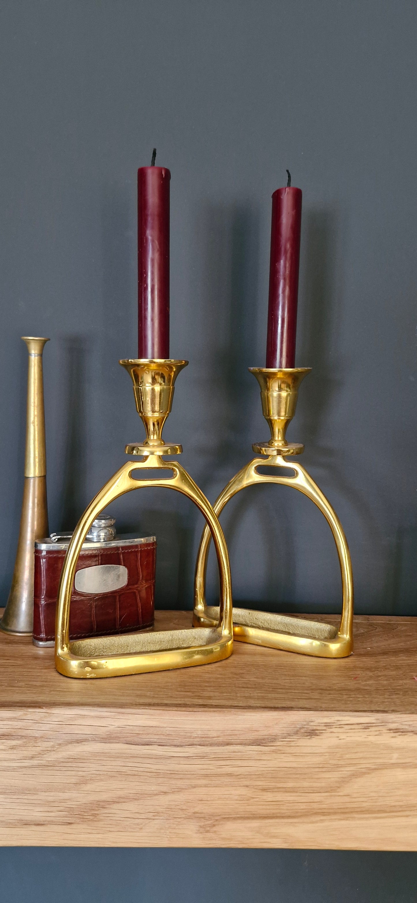 - Pair of gold Plated Stirrup Candlestick Holders